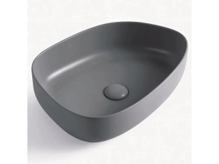 Renov&aacute; tu ba&ntilde;o con la Bacha de apoyo oval cer&aacute;mica mate Forma gris, un elemento que combina estilo y funcionalidad. Su dise&ntilde;o moderno y elegante, con un acabado mate en color gris, transformar&aacute; tu espacio en un ambiente sofisticado y actual.