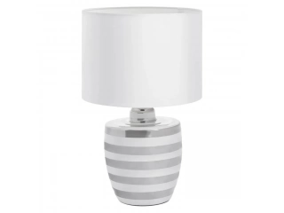 Dale un toque de estilo a tu hogar con la L&aacute;mpara de mesa Mariana blanca 1 luz E27. Su dise&ntilde;o cl&aacute;sico y elegante, con base de cer&aacute;mica en blanco y plateado, le dar&aacute; un toque sofisticado a cualquier ambiente. La l&aacute;mpara tiene un di&aacute;metro de 24 cm y una alt
